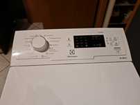 Pralka elektrolux etw1062 IDW ladowana od góry urwany krzyżak.