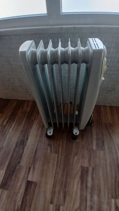 Vendo Aquecedor a Óleo da marca Taurus com 5 divisórias de calor