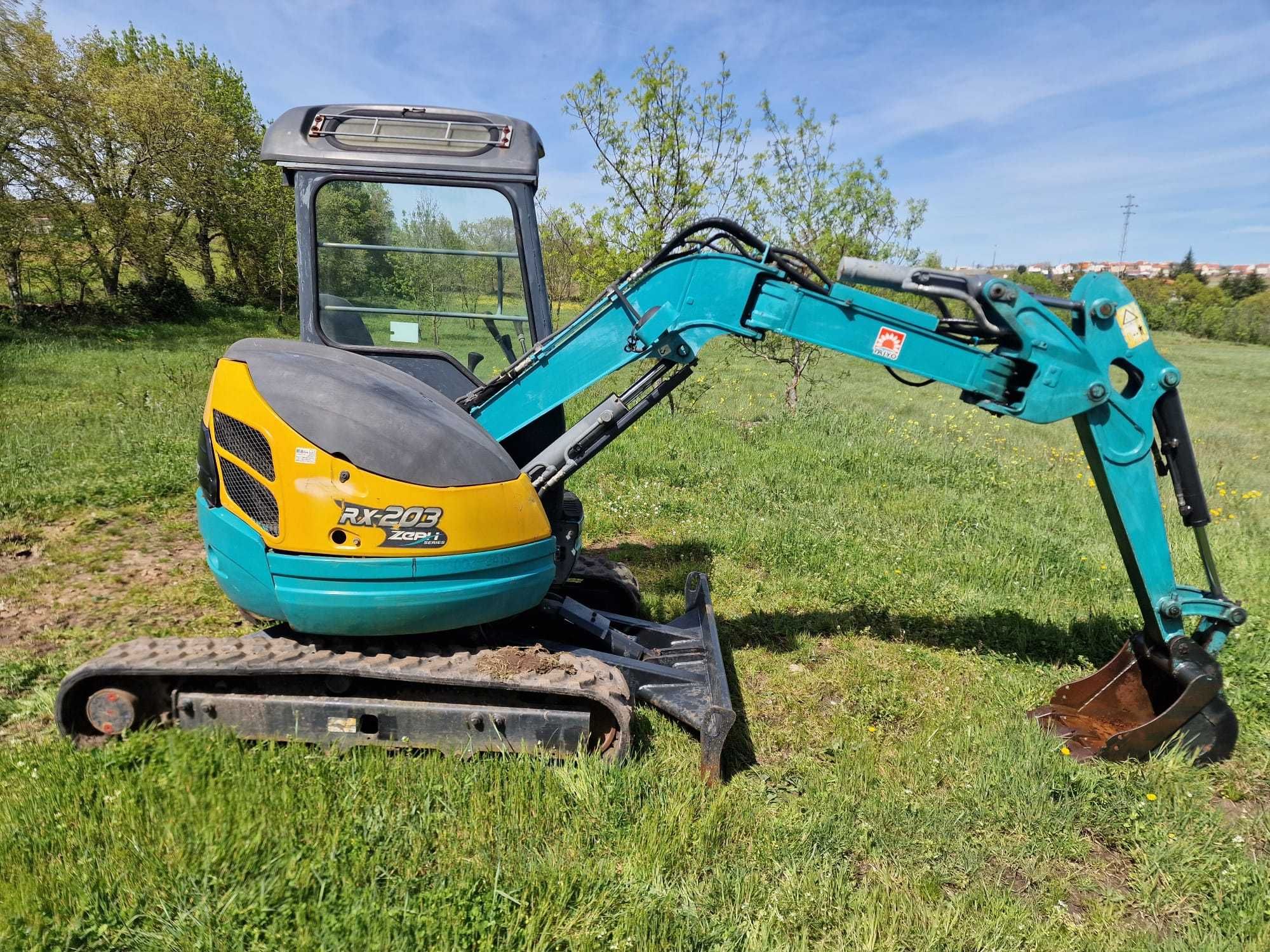 Giratória / Escavadora Kubota RX-203 - Braço articulado - 2 Toneladas