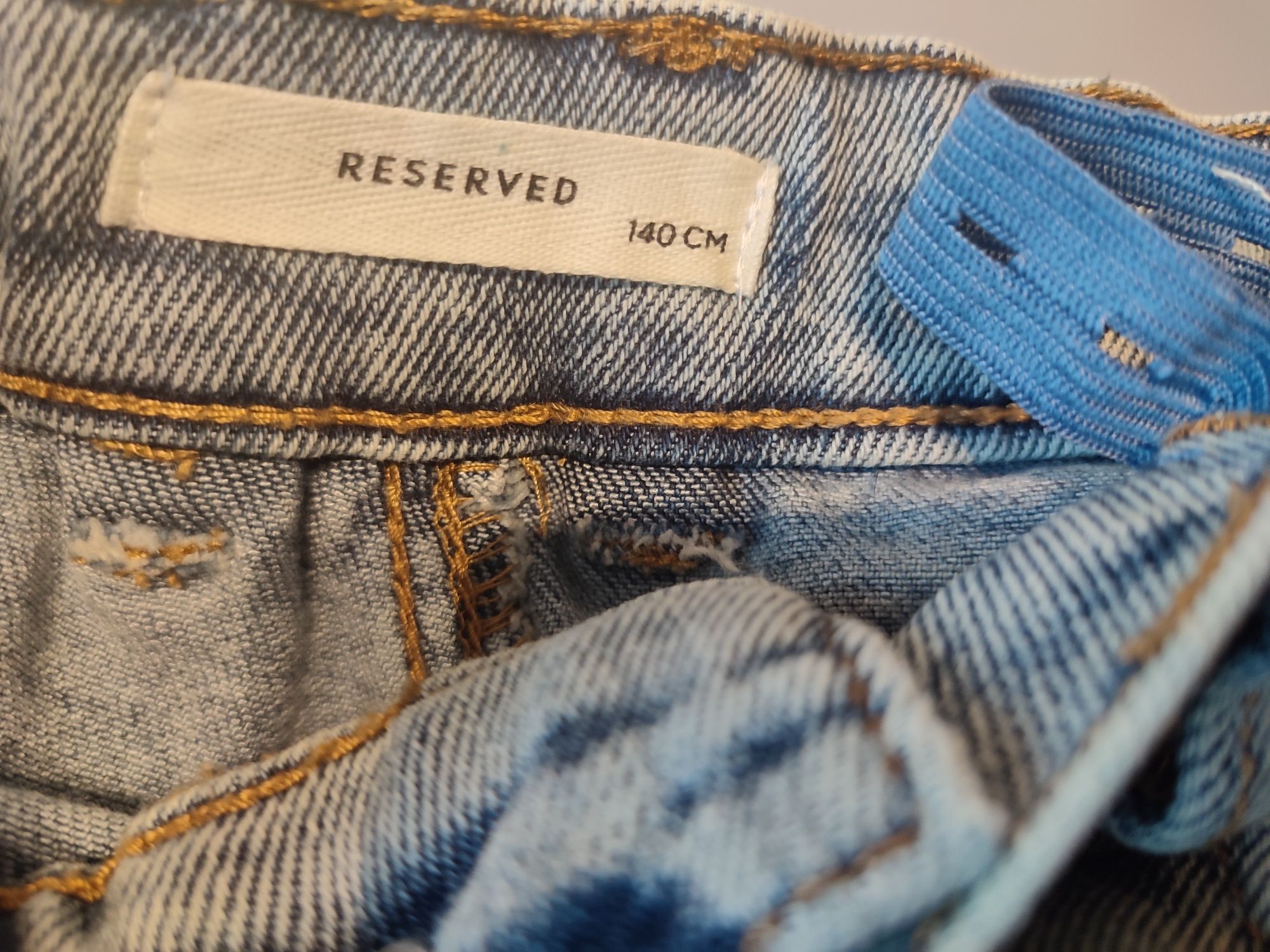 Spodnie jeansowe,szerokie Reserved