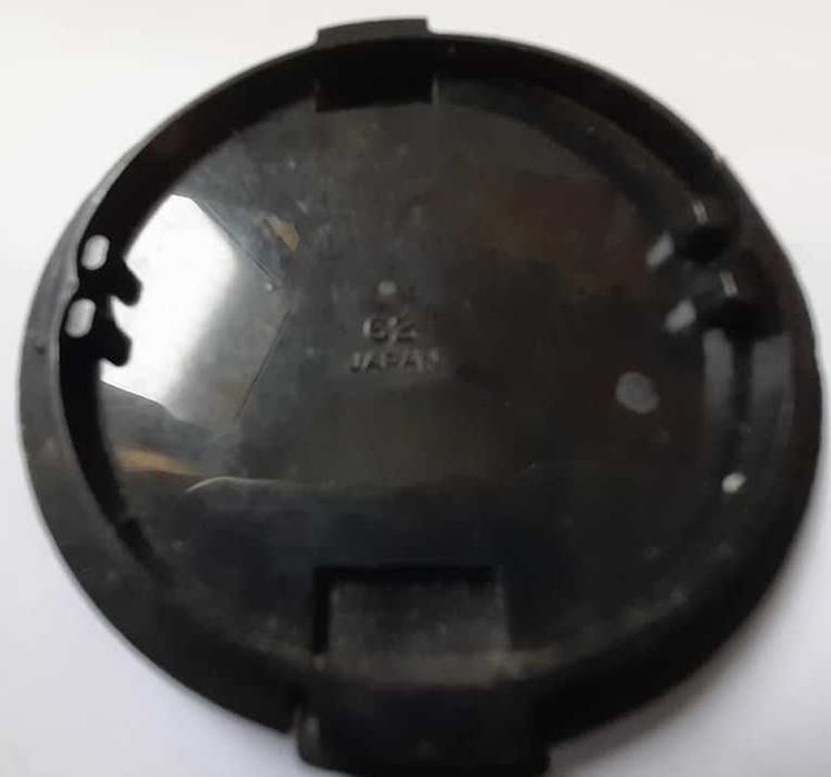 Tampa de lente Kónica