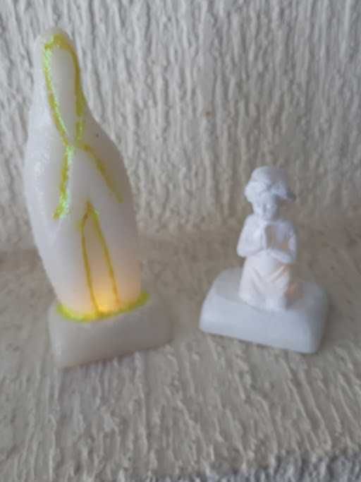 Santas e anjos estilizados com luz interior