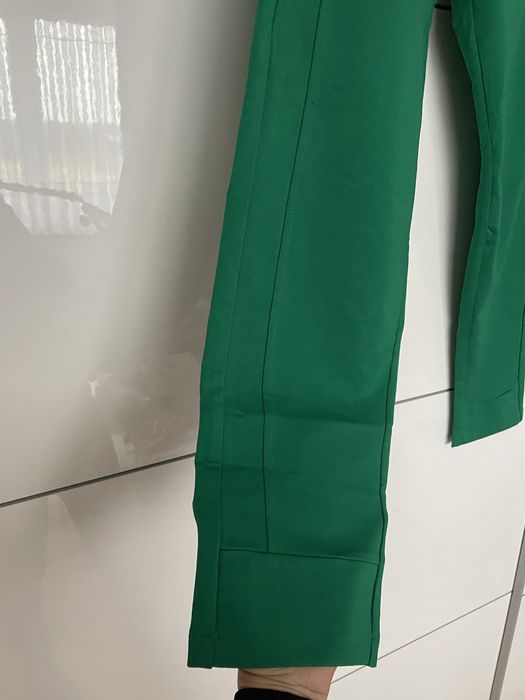 Nowe spodnie dresowe z przeszyciami rozmiar XL