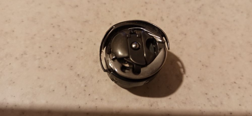 Шпульки, шпульні ковпачки, голки до швейних машин