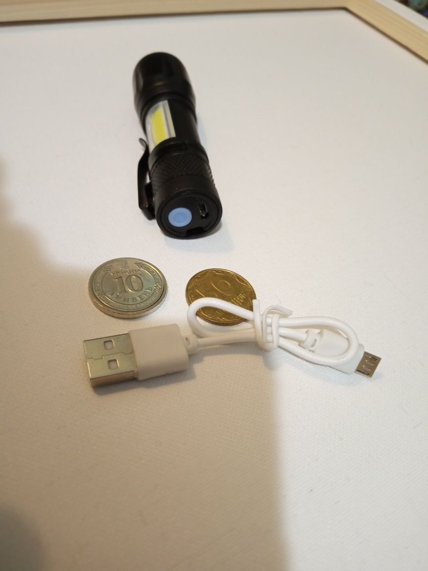 Потужний кишеньковий ліхтарик. Заряджається від USB.
