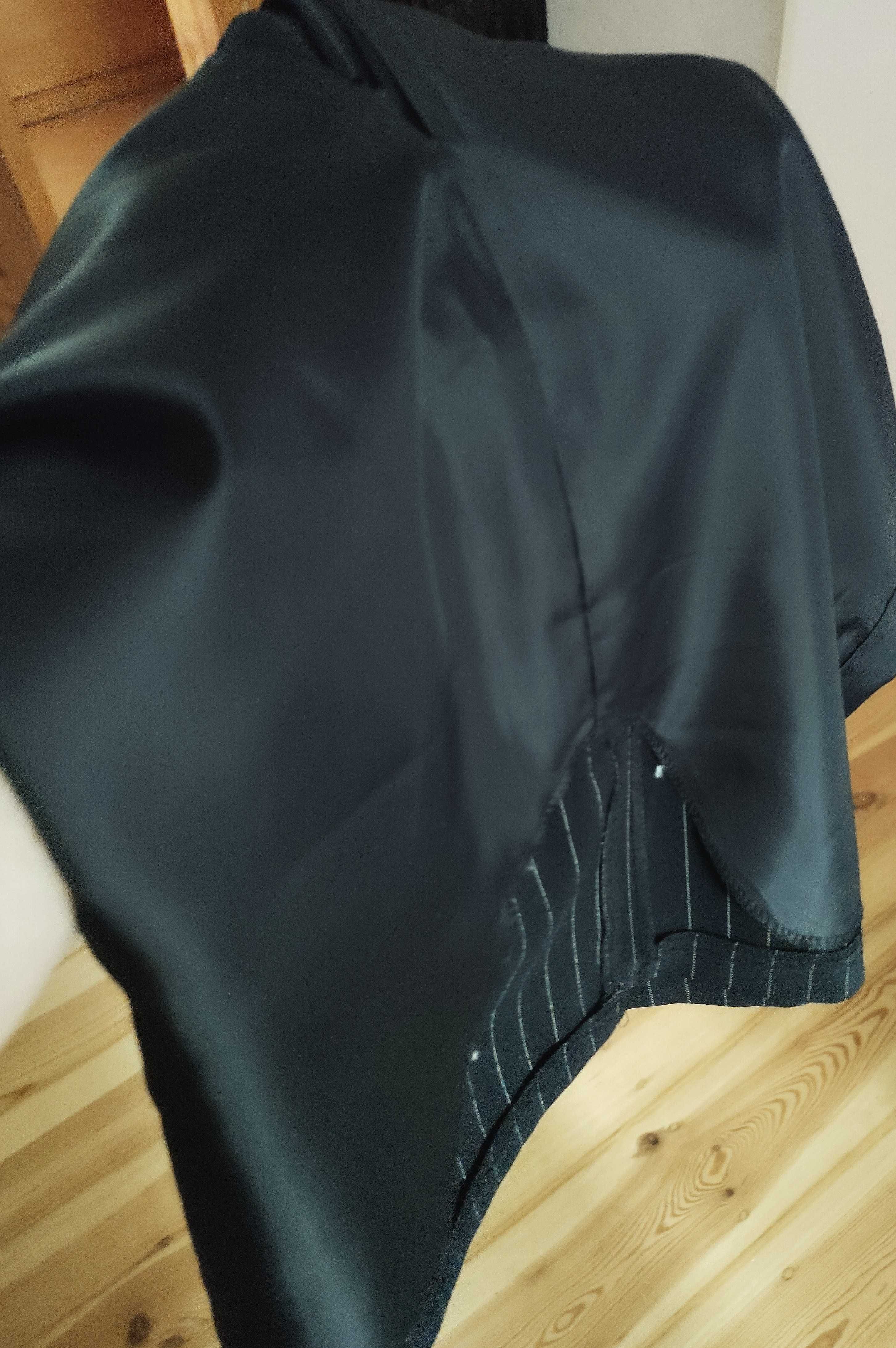 Czarna klasyczna , wąska spódnica przed kolono
