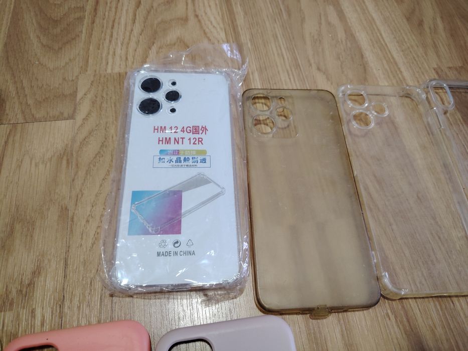 Various covers for different mobile phone models.64740756387075123