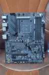 Материнська плата Asus rog strix b550-e gaming