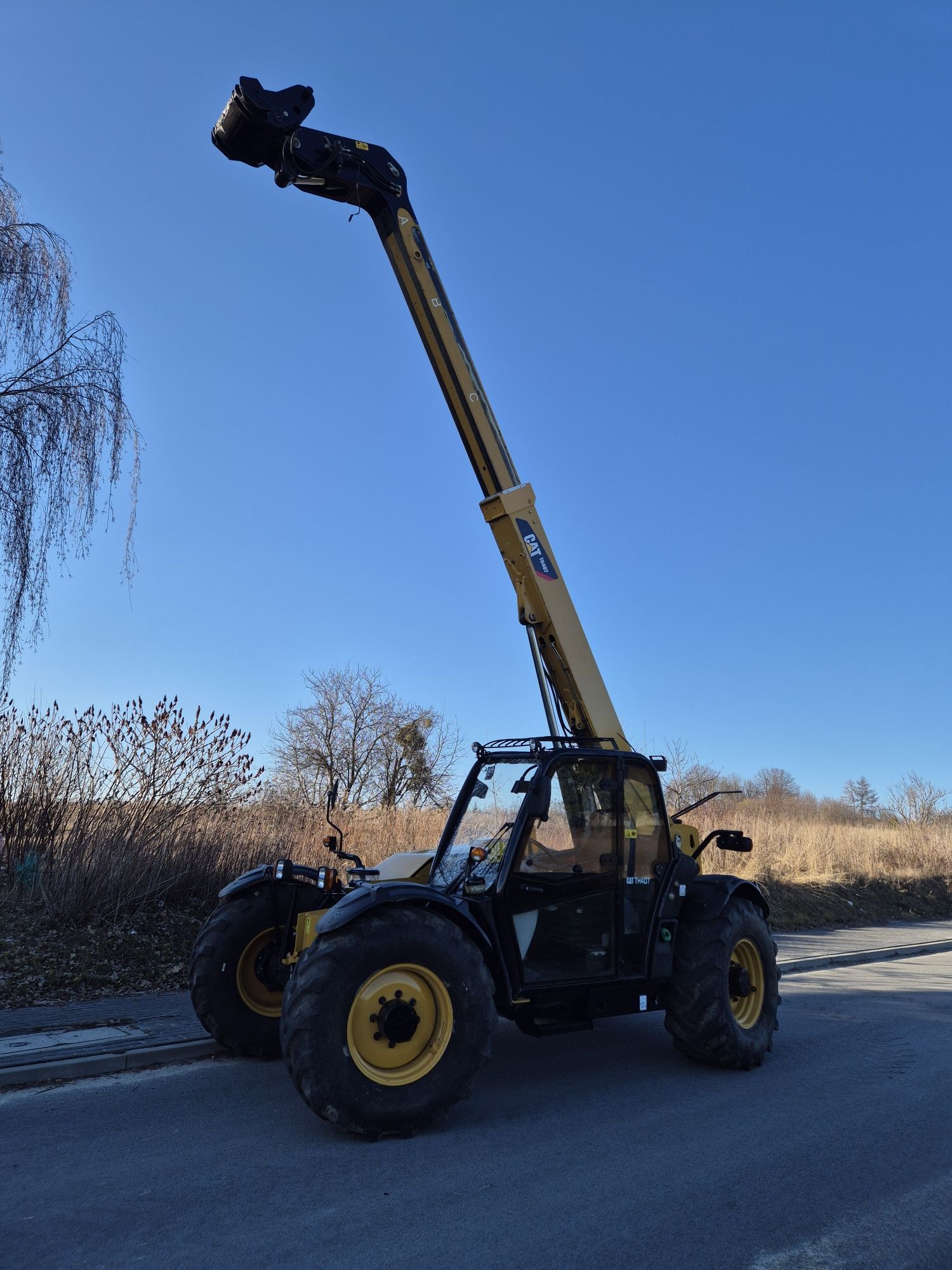 Ładowarka  Teleskopowa Caterpillar  CAT TH407 09rok 4 tony 7 m 40 km/h