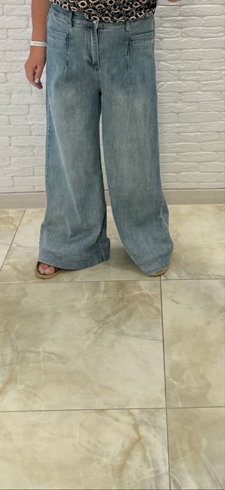 Джинсы  в отличном состоянии на 50-56 раз по 1000 гр за каждые