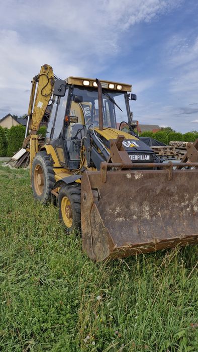 Koparko ładowarka CAT 438C