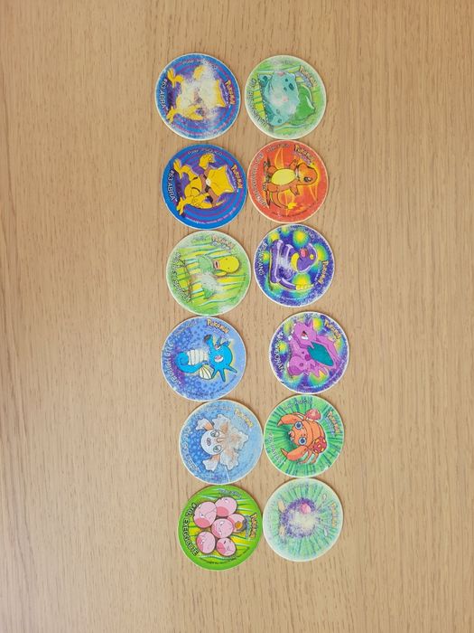 Tazos Pokémon – 1ª Edição Matutano (12 unidades) Com sinais de uso
