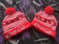 Dwie czapki Coca-Cola