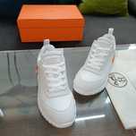 Białe buty sportowe Hermes