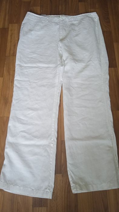 Білі широкі льняні брюки. we