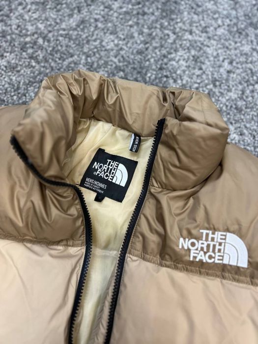 Пуховик бежевий TNF