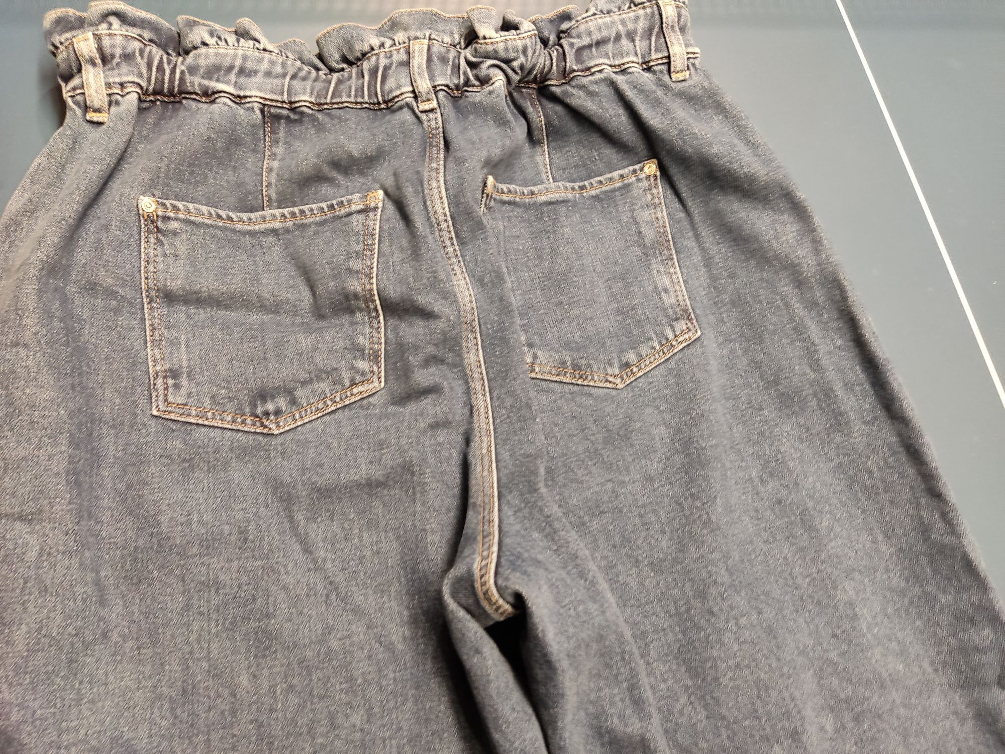 Spodnie jeans firma Orsay rozmiar 44 jak nowe