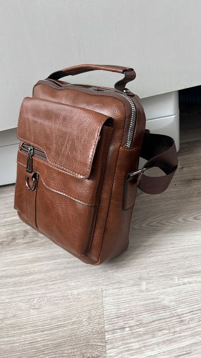 Brązowa torba męska na ramię wym.22*26*7 cm..