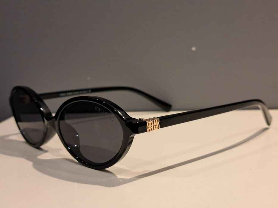 MIU MIU czarne nowe okulary przeciwsłoneczne jajeczka zlote logo filtr