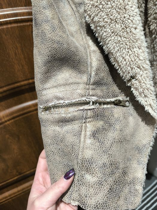 Kamizelka połyskujaca z ociepleniem