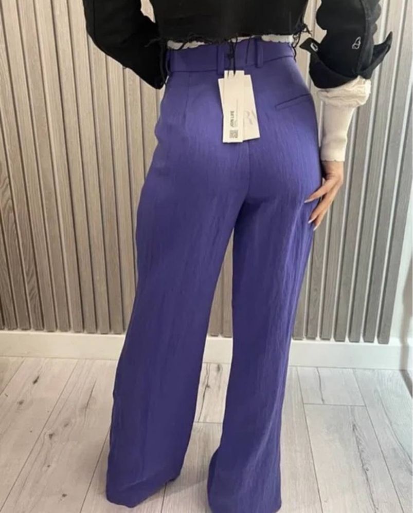 Нові Брюки zara лавандового кольору