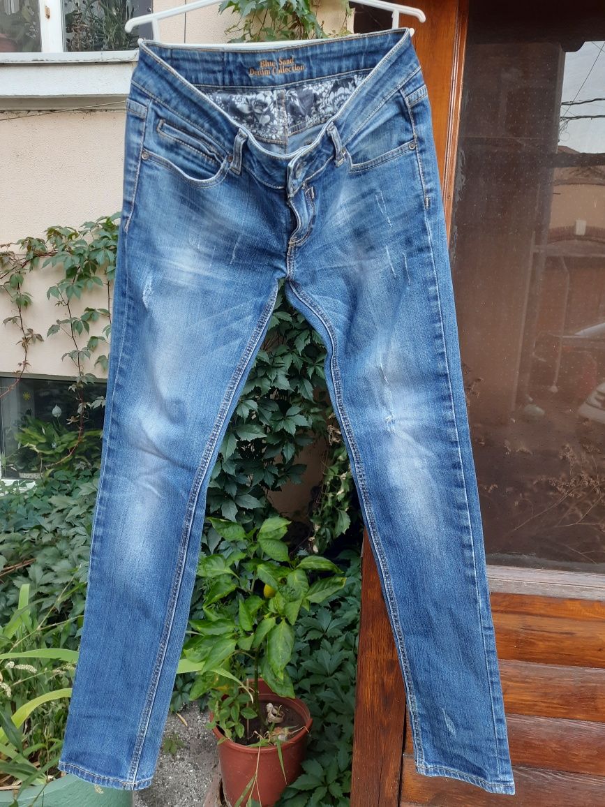 Стрейчевые джинсы фирмы Philipp Plein