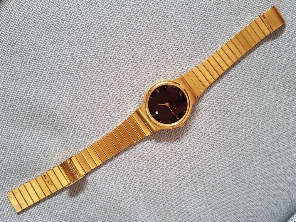 Panel fotowoltaiczny zegarek solarny pozłacany zegarek vintage antyk