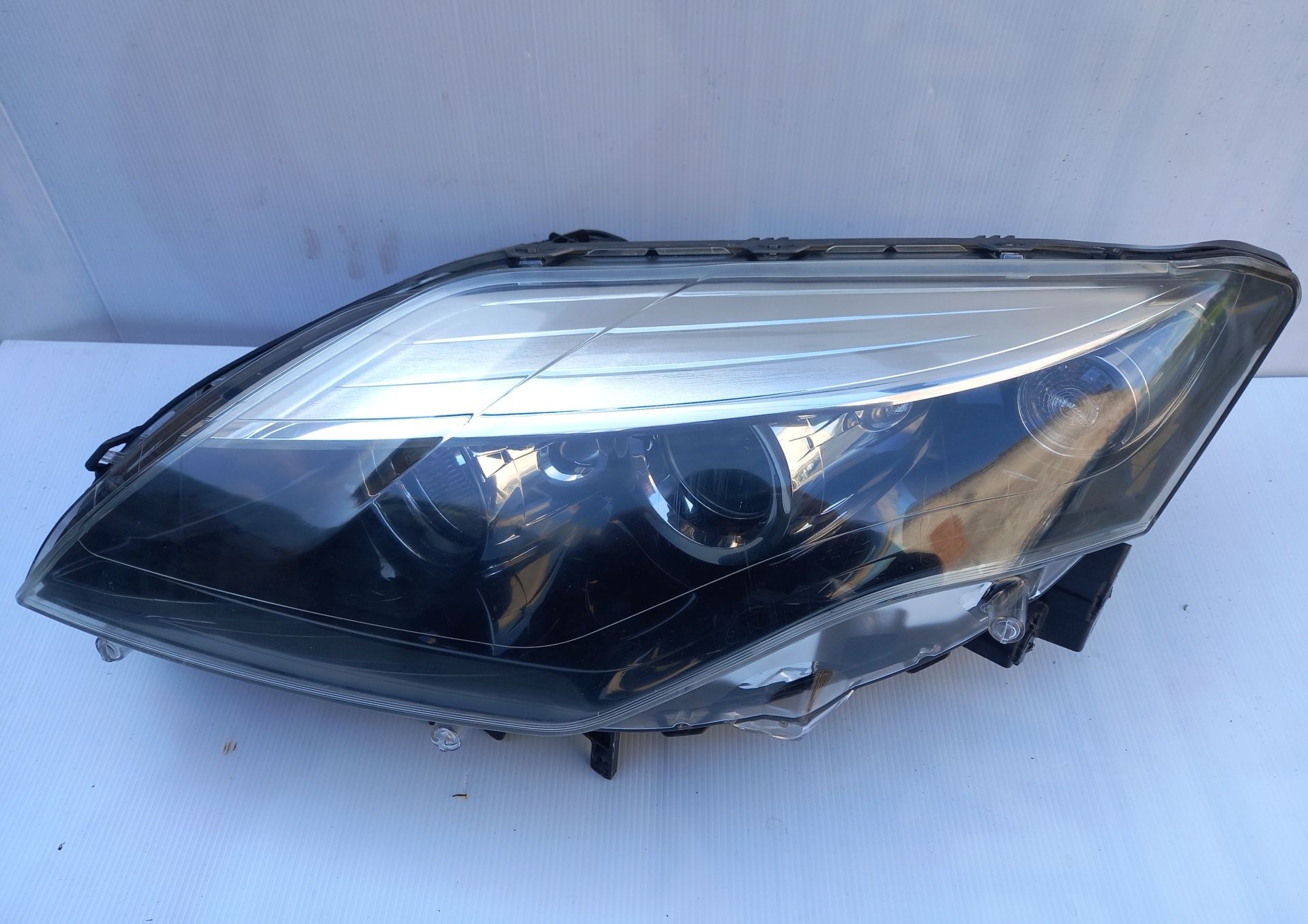 Renault Laguna III lift EUROPA lampa lewa soczewka