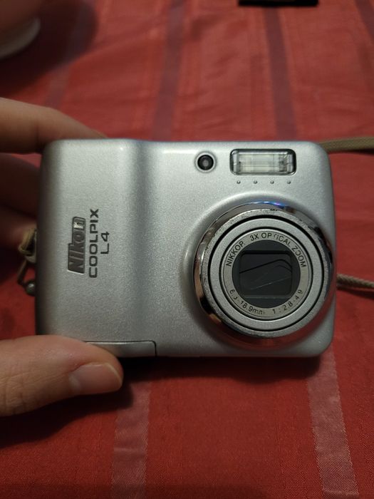 Nikon  Coolpix L4 uszkodzona bateria