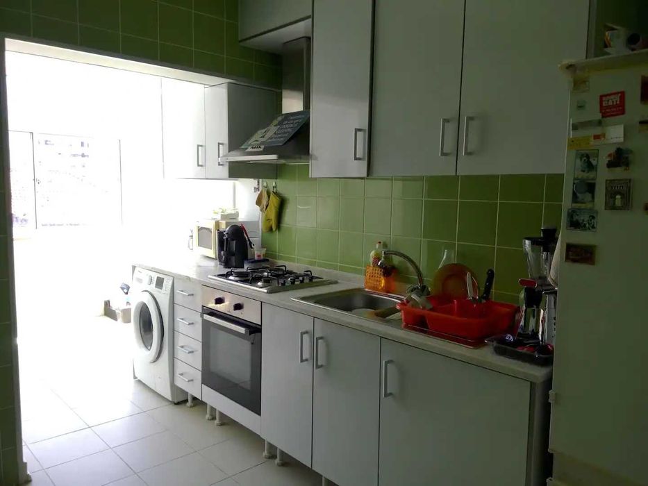 Quarto com varanda em Coimbra