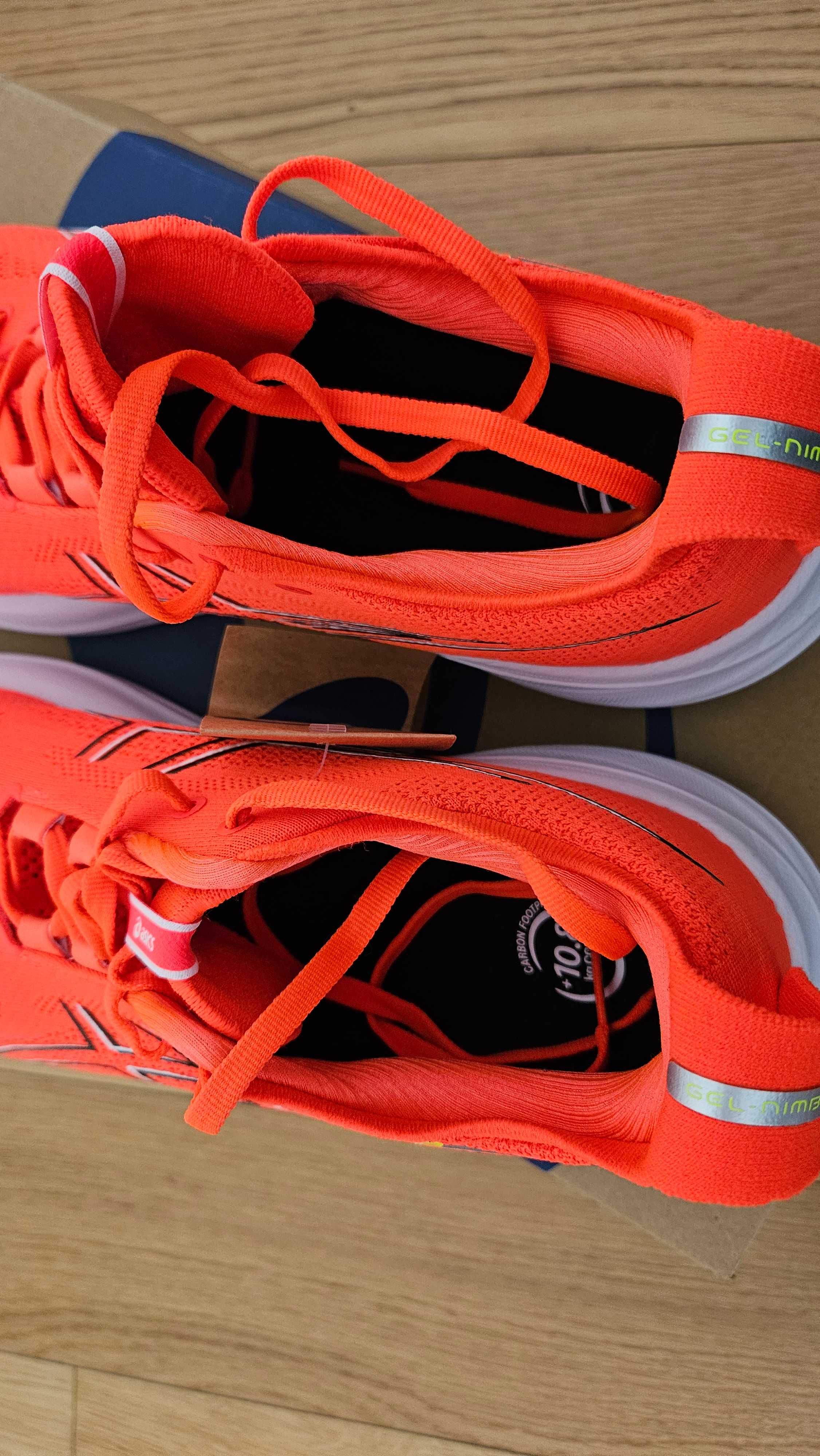 Asics Nimbus 26 buty do biegania W 45 28,75cm czerwone Wawa Mokotów