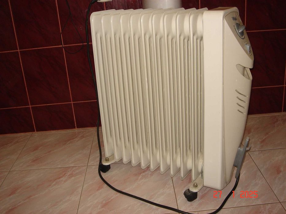 Масляный обогреватель Vitek VT-1714.  2.5квт.