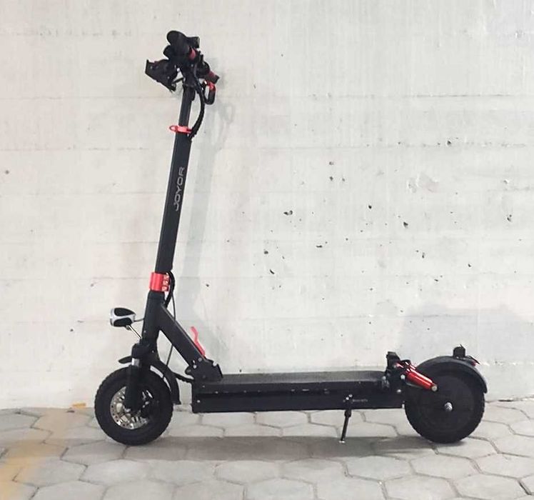 Trotinete elétrica Joyor com amortecedores e rodas de câmara de ar