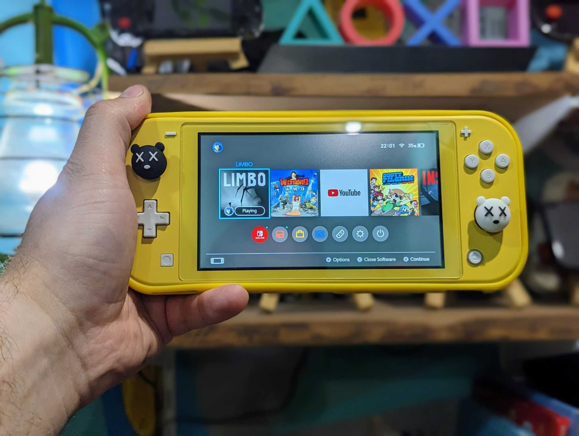 Nintendo Switch Lite: чохол-бампер, накладки на джойстики Набір — 2в1