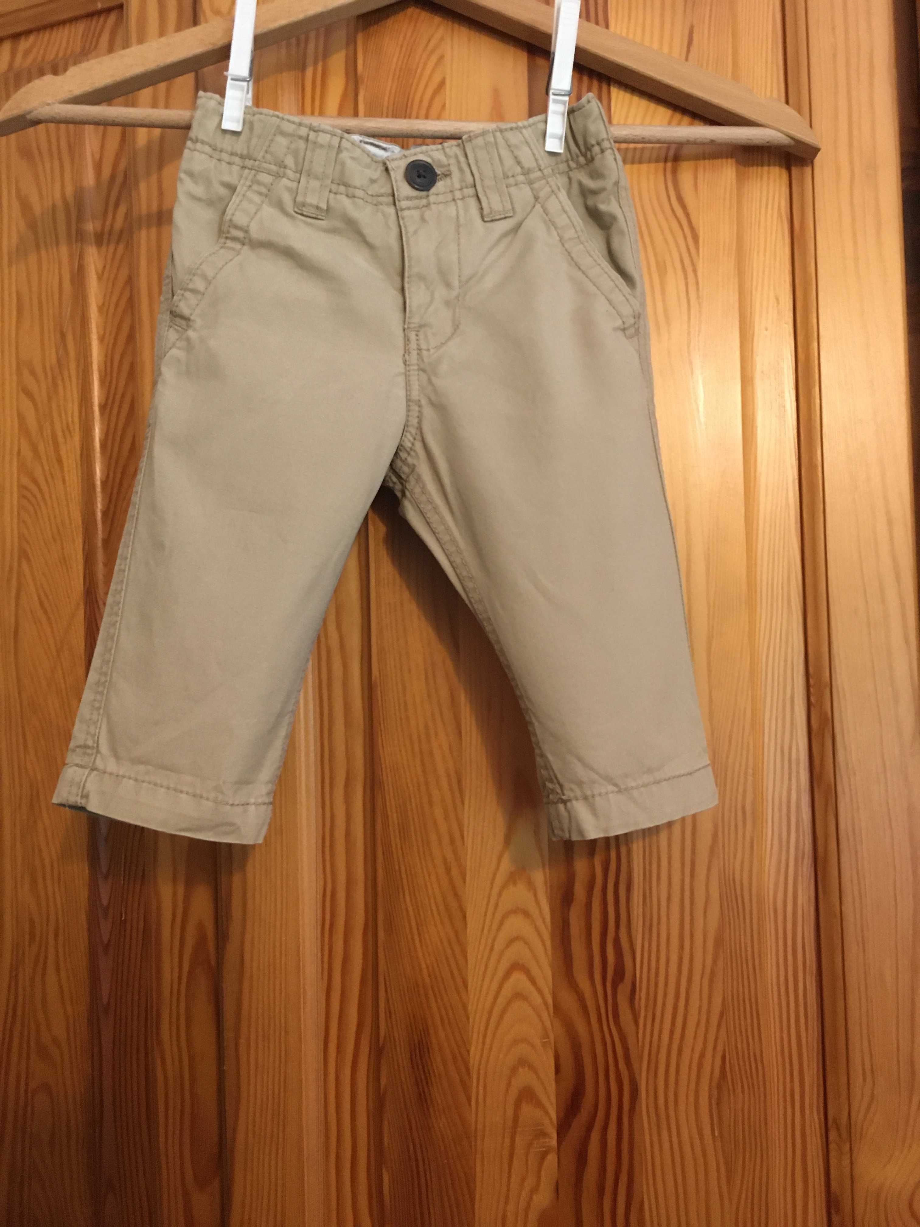 Beżowe spodnie chłopięce HM jak nowe spodnie dla chłopca 68