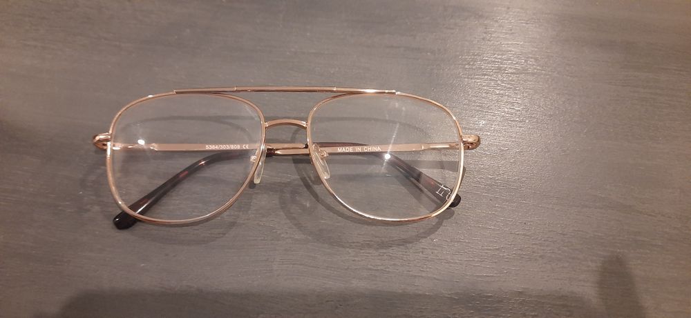 Armação óculos dourada sem graduação