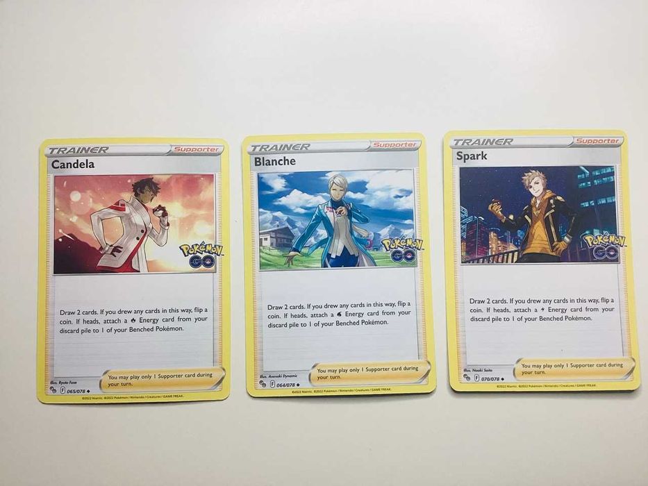 Cartas Pokemon Go Evoluções Charizard Tyranitar Treinadores e outros