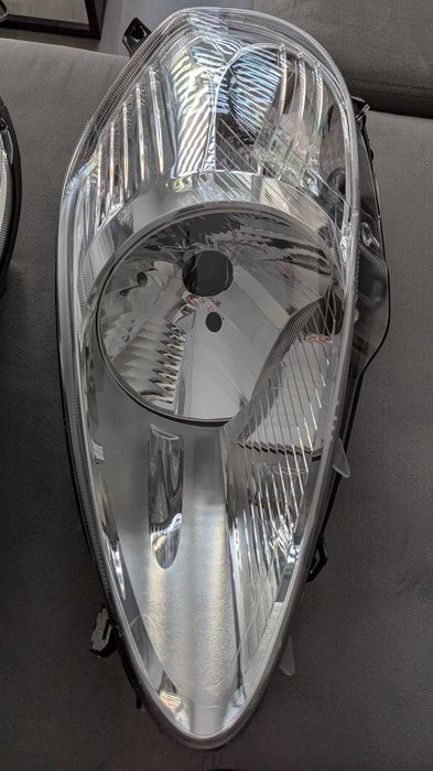 Reflektory lampy światła przednie L+P Fiat Grande Punto - NOWE