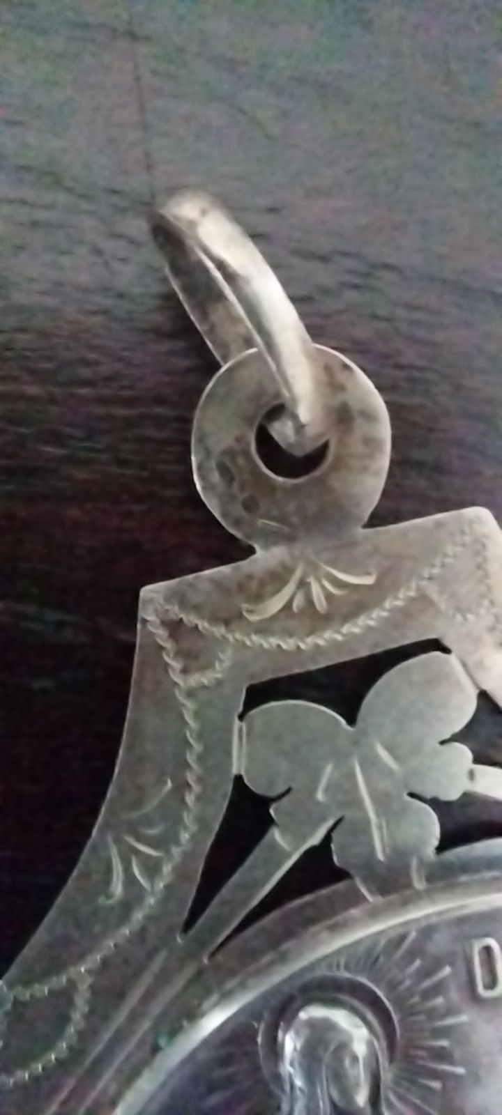 Medalha antiga em prata