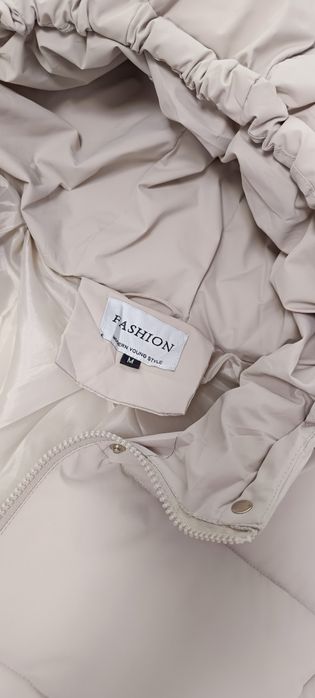 Зимова куртка на затяжках