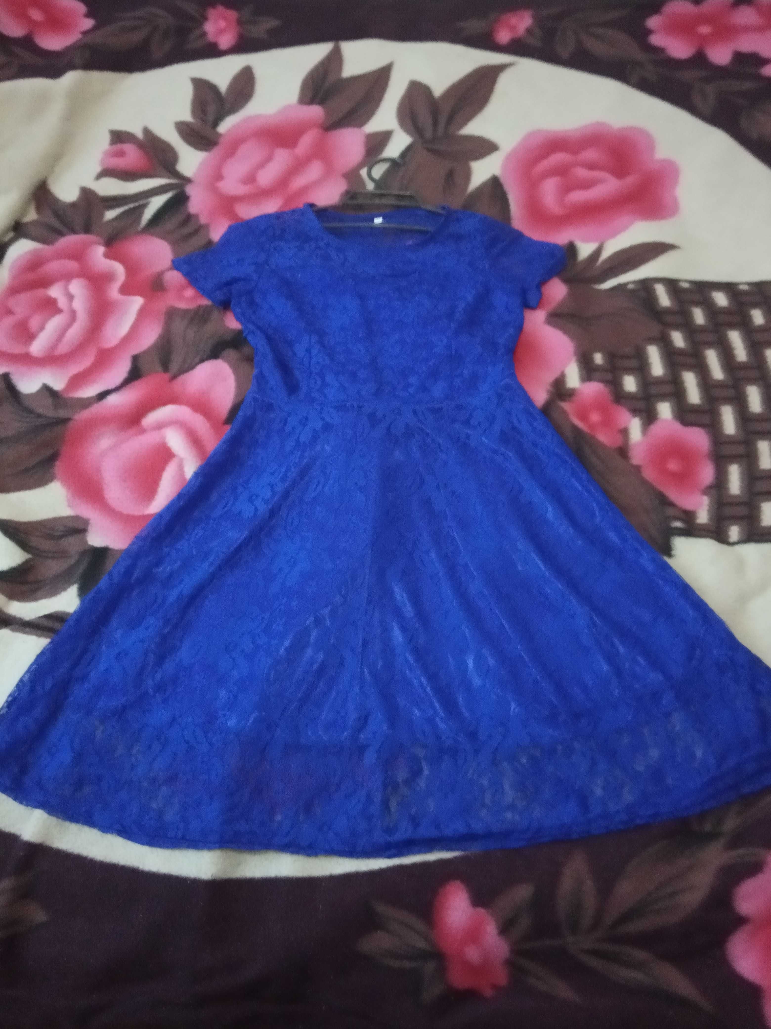 Сукня ,гіпюрова,нова,синього кольору.