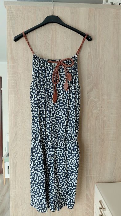 Granatowy kombinezon damski w kwiaty sinsay s