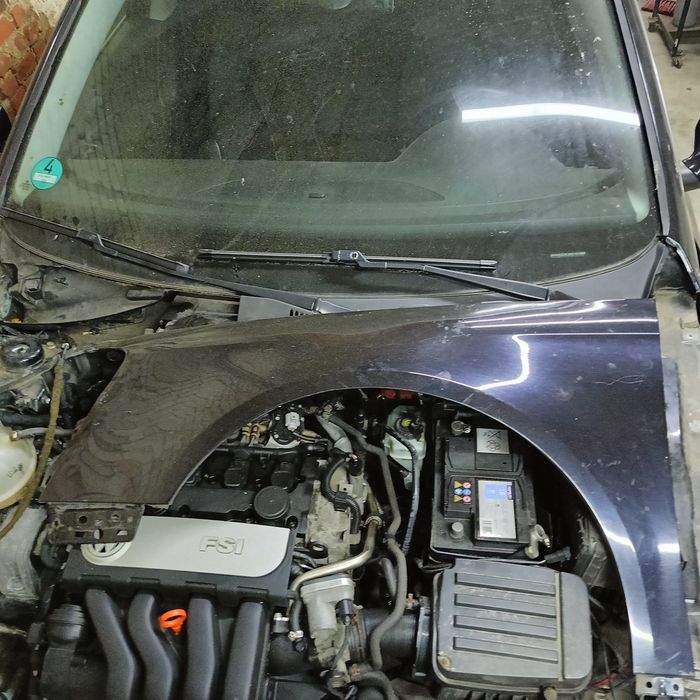 Błotnik przedni lewy Passat B6 LC9X