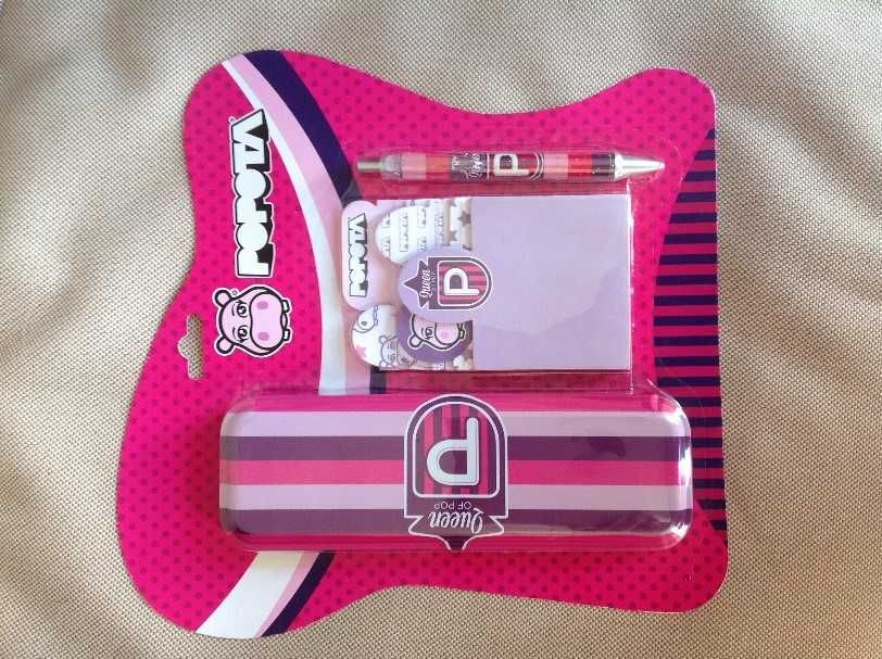 "POPOTA": 1 estojo + 1 esferográfica + 3 blocos + 1 grinalda p/ festas