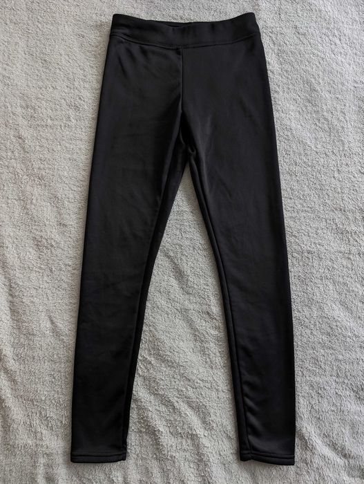 Czarne ocieplane futerkiem spodnie legginsy 128 - 134 - 140 jak nowe