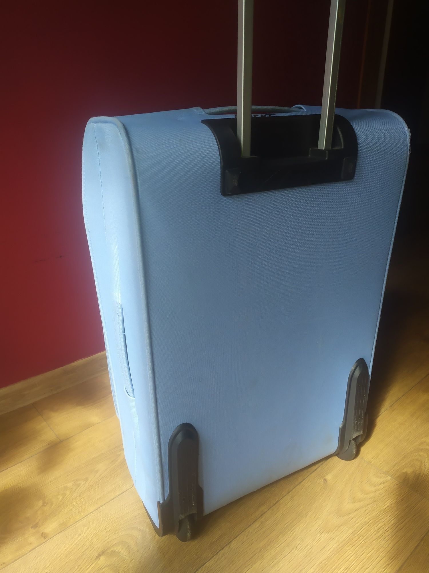 Duża walizka na 2 kółkach rozszerzana Samsonite błękitna 62x41x31cm