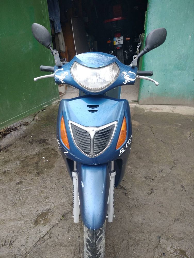 Продам мопед скутер Honda sh 125