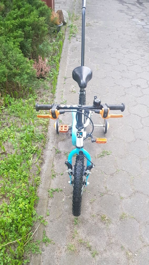 Rowerek dla dzieci z kółkami bocznymi i pałąkiem