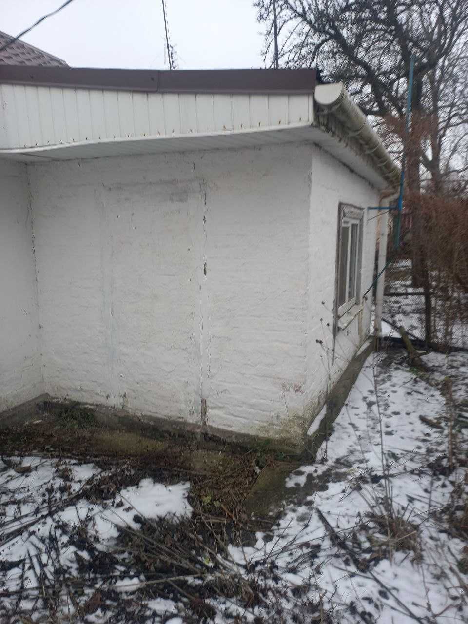 Продається 1/2 будинку в р-н Станції "Сміла"