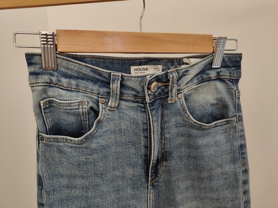 Джинсы голубые клеш женские